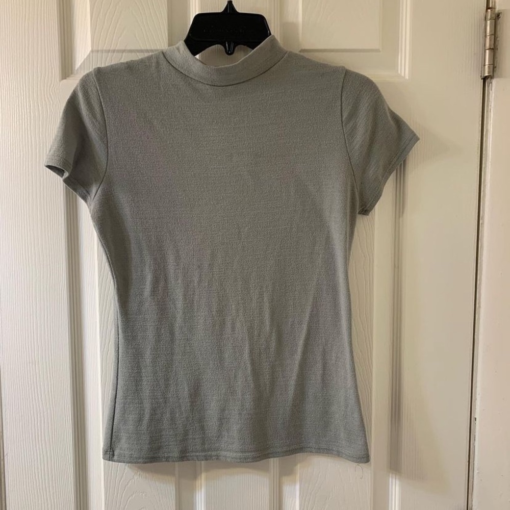 Small sage green mock neck shirt